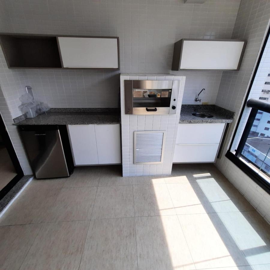 Appartamento Flat em Pitangueiras - sacada gourmet, 3 dorms, limpeza diária e serv de praia Guarujá Esterno foto