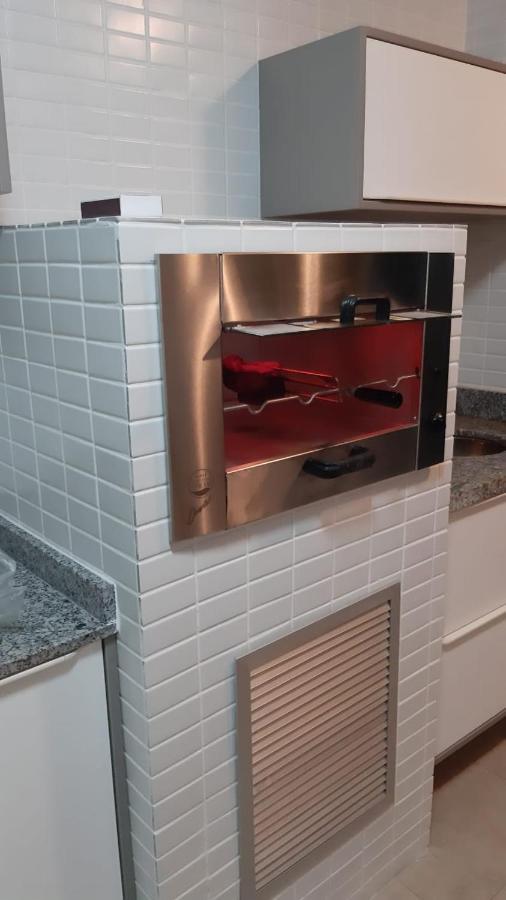 Appartamento Flat em Pitangueiras - sacada gourmet, 3 dorms, limpeza diária e serv de praia Guarujá Esterno foto