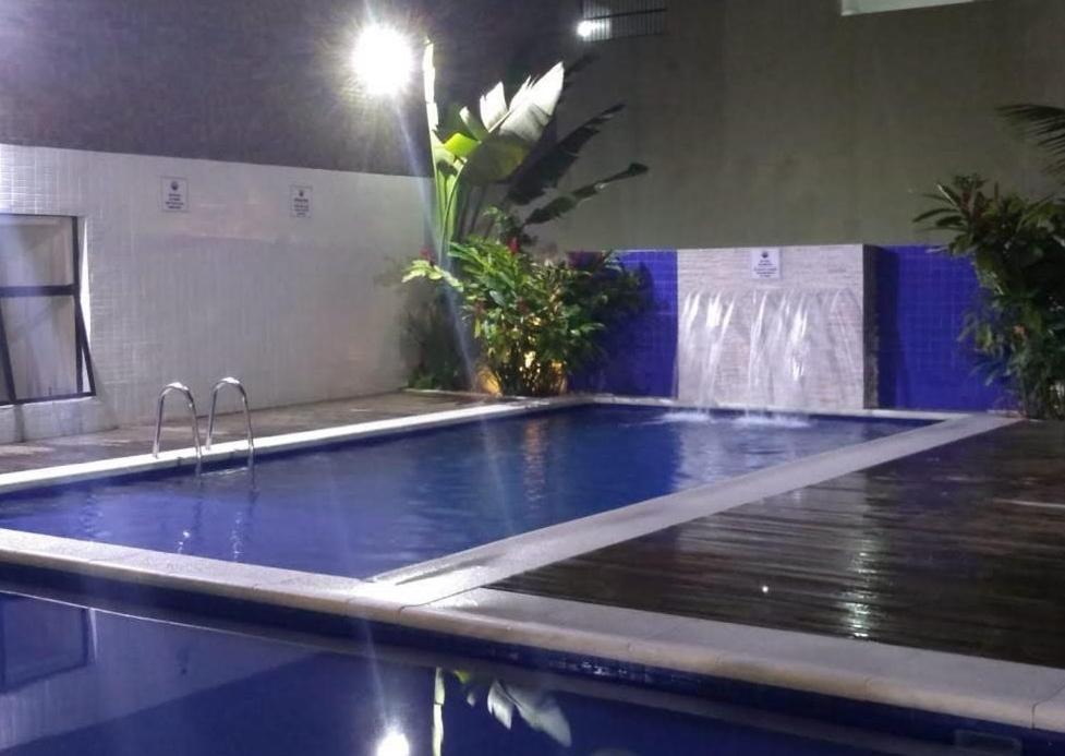 Appartamento Flat em Pitangueiras - sacada gourmet, 3 dorms, limpeza diária e serv de praia Guarujá Esterno foto